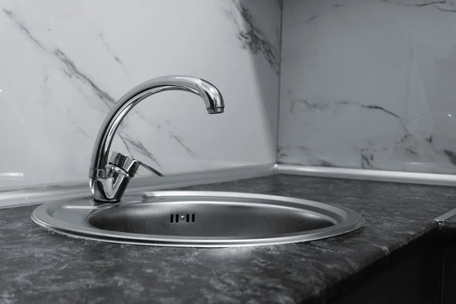 Garbage disposal humming but not working under a kitchen sink