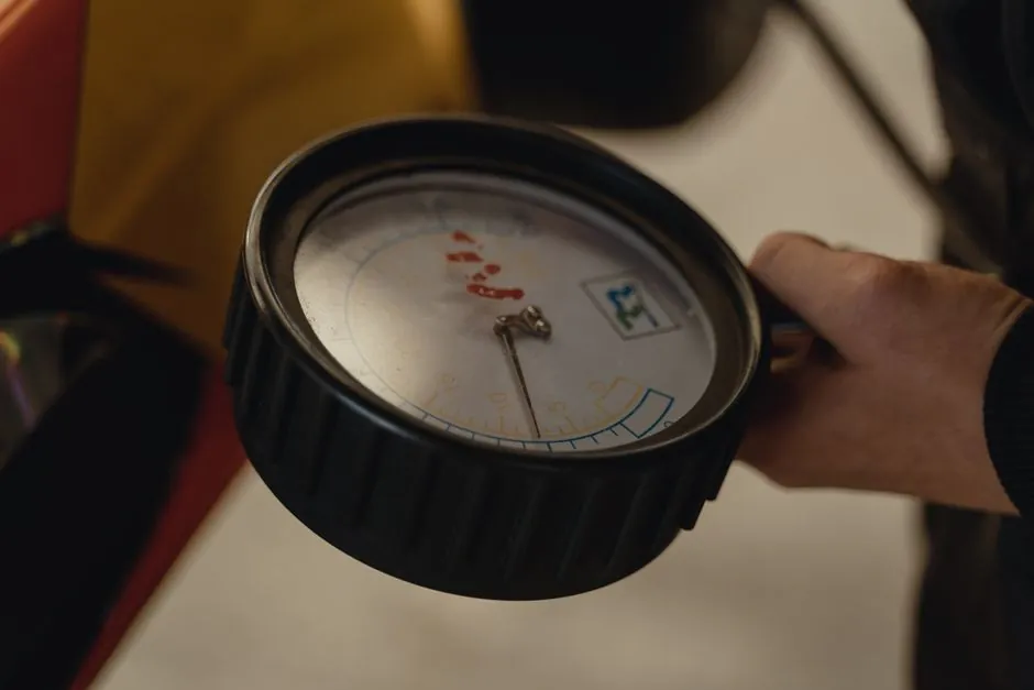 Pressure gauge showing high water pressure signs on home water supply